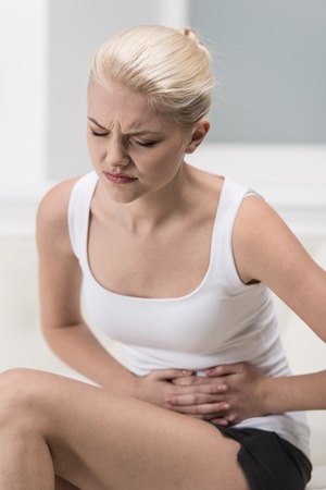woman with bladder pain